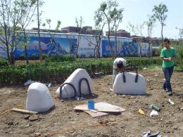 hj1736 石雕—箱包_青島國際服裝城不銹鋼雕塑、石雕、玻璃鋼雕塑_濱州宏景雕塑有限公司